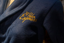 Load image into Gallery viewer, The Polar Express robe. The words "The Polar Express" are embroidered on upper left while the right bottom pocket features a bell design and "Believe" embroidery